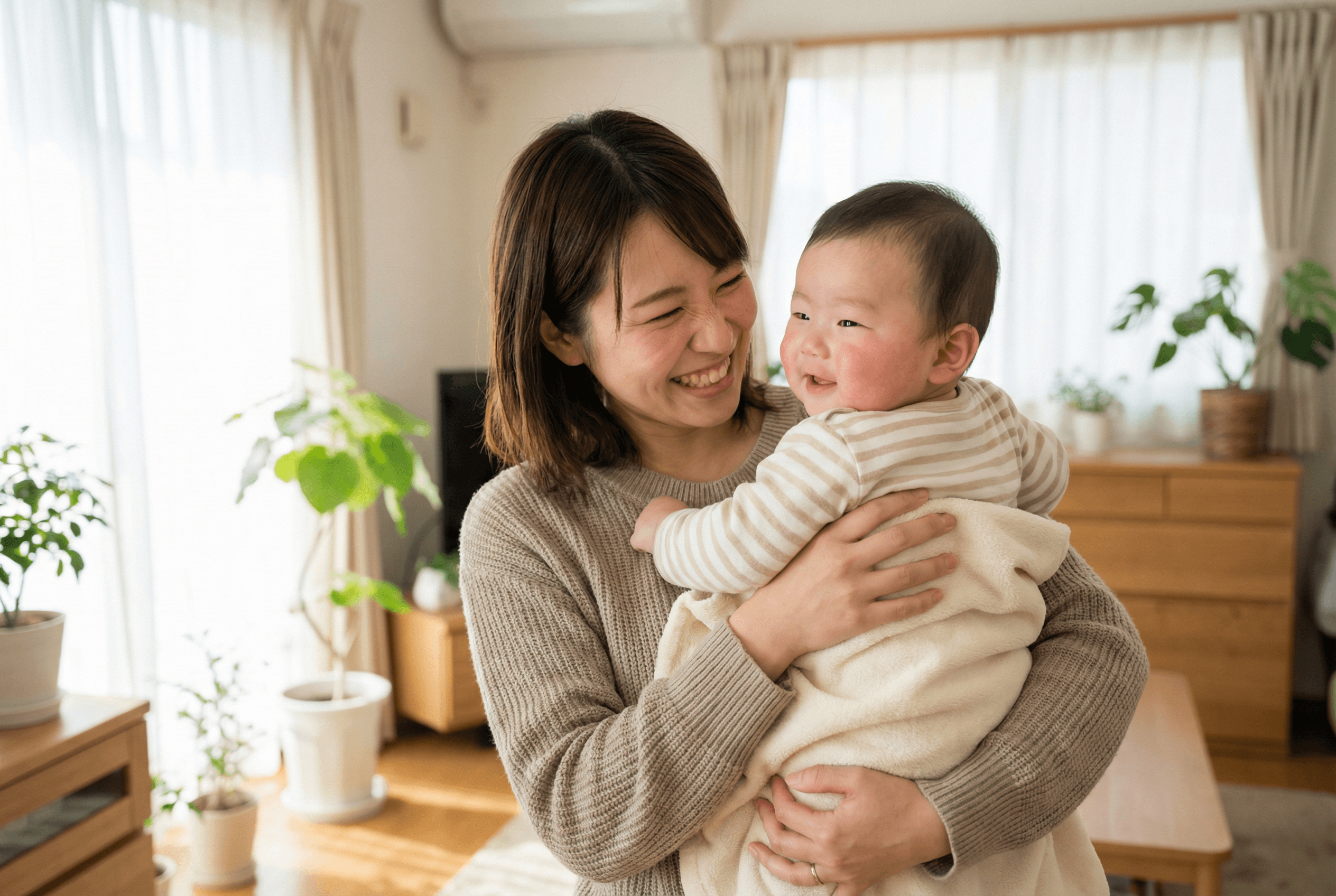 ママと赤ちゃんの笑顔のイメージ